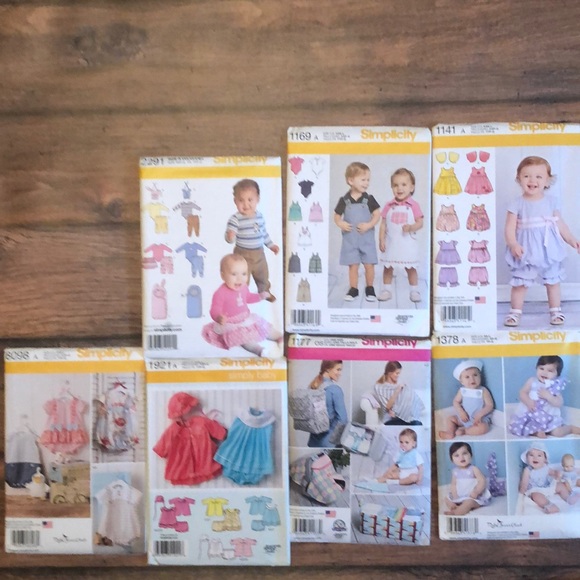 Set of Seven Simplicity Baby Patterns - Picture 1 of 15